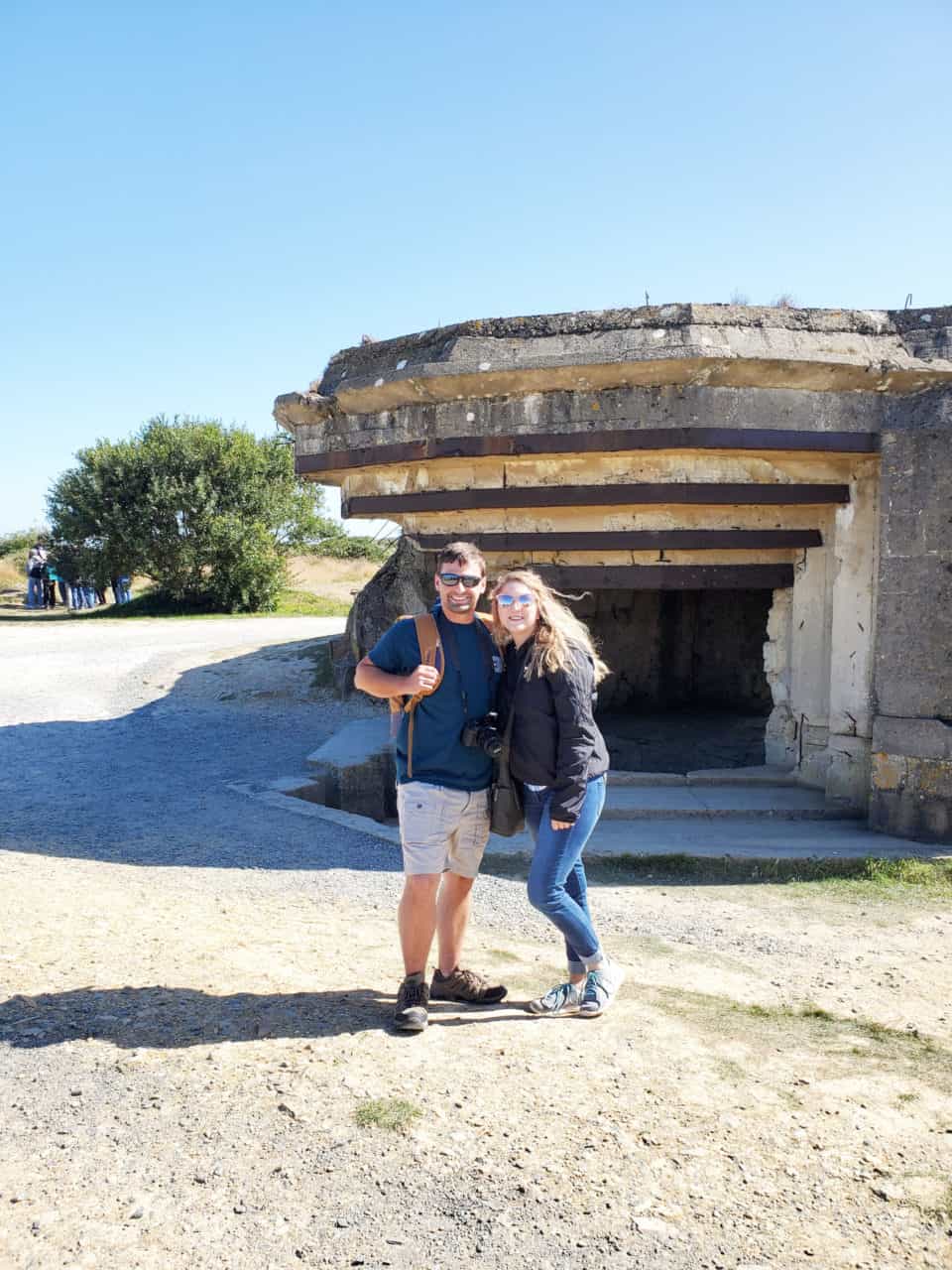 Me and Brett in front of a German bunker at Pointe Du Hoc.