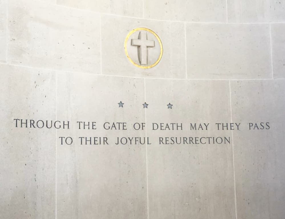 A quote from inside the chapel at the cemetery. It says "Through the gate of death may they pass their joyful resurrection". 