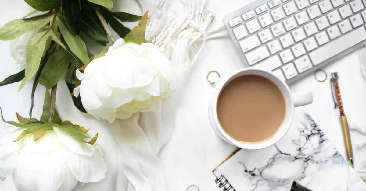 Declutter Email- Desk- Keyboard- Coffee- Flowers